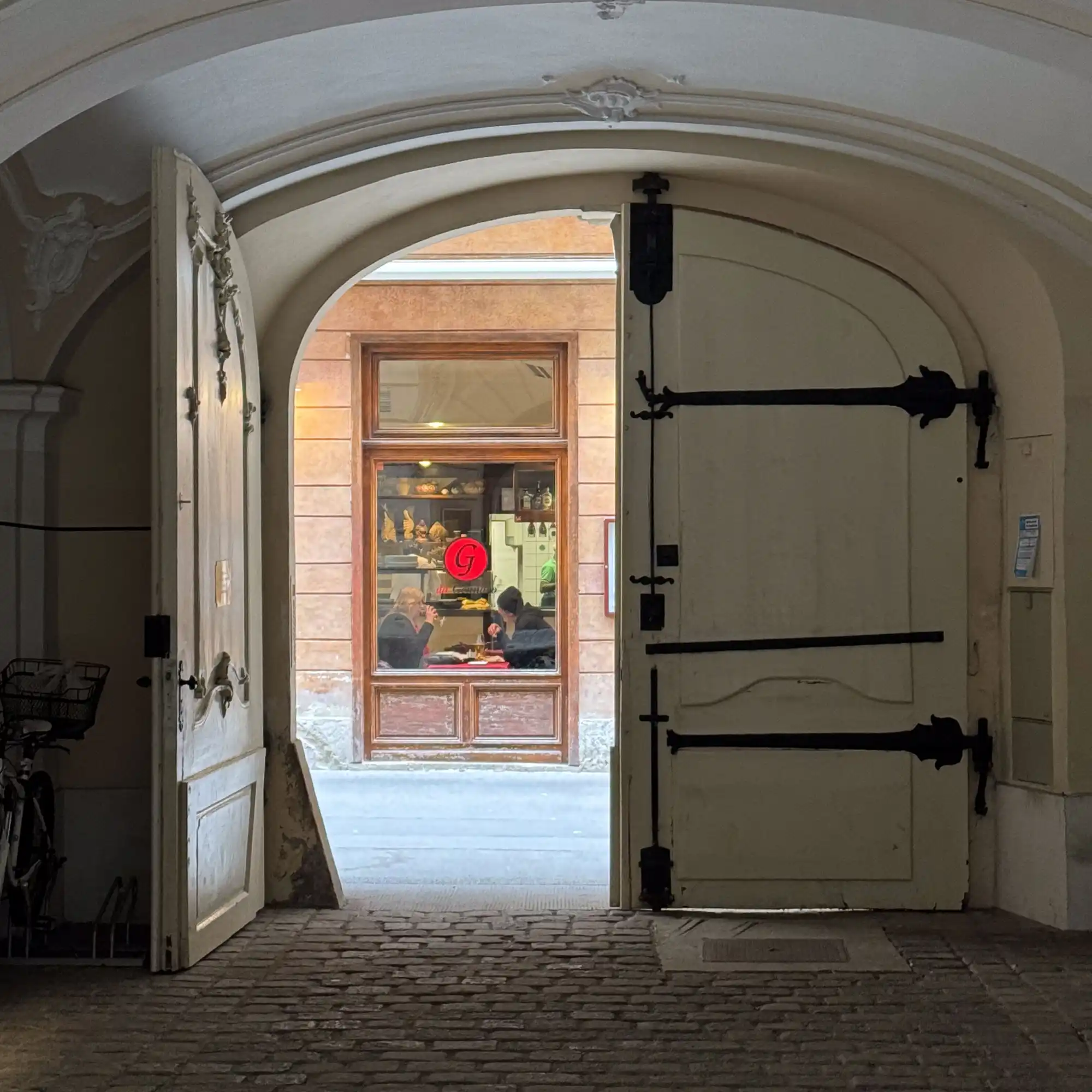 A historic Viennese building’s entryway leading to the street